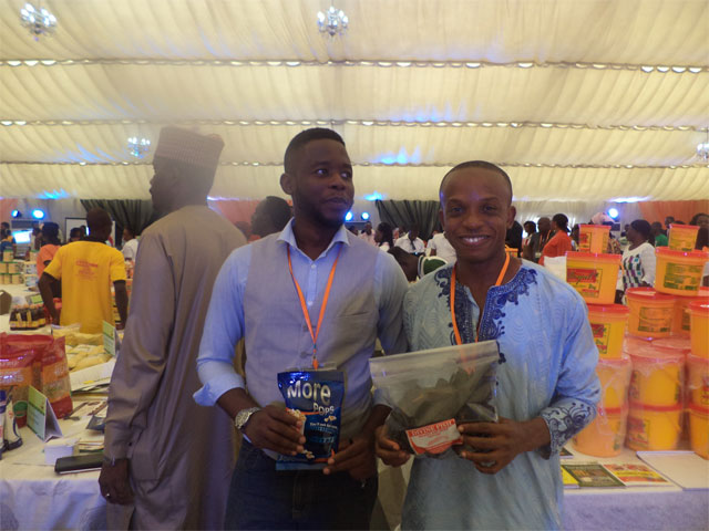 Olufemi Olumide of Motherland Recipies and Foods and Ugochukwu Ukwuegbu of Divine Fish Farm at Youwin Made in Nigeria Trade Exhibition